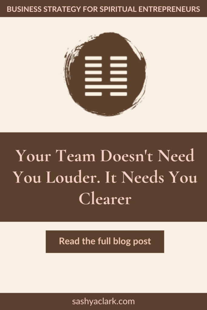 A brown circle of paint with the iChing Hexagram of Gate 7 cut out in white. The text reads, "Your Team Doesn't Need You Louder. It Needs You Clearer. Read the full blog post. sashyaclark.com"