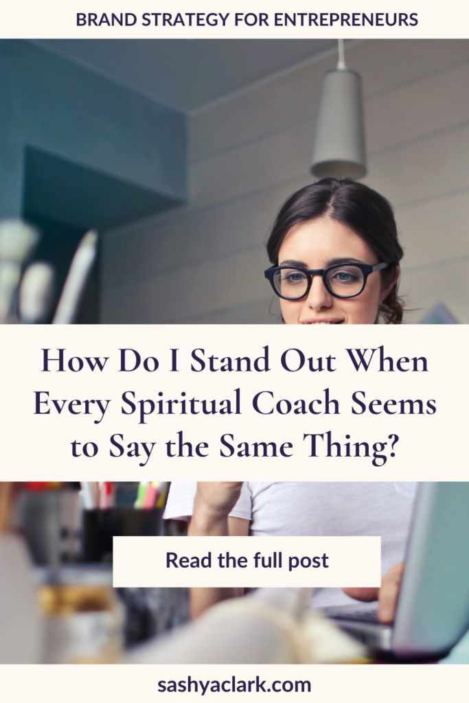 Woman in a white tshirt with a smart phone in her hand,  the text overlay says, "How do I stand out when every spiritual coach seems to say the same thing? by Sashya Clark, Brand Strategist"