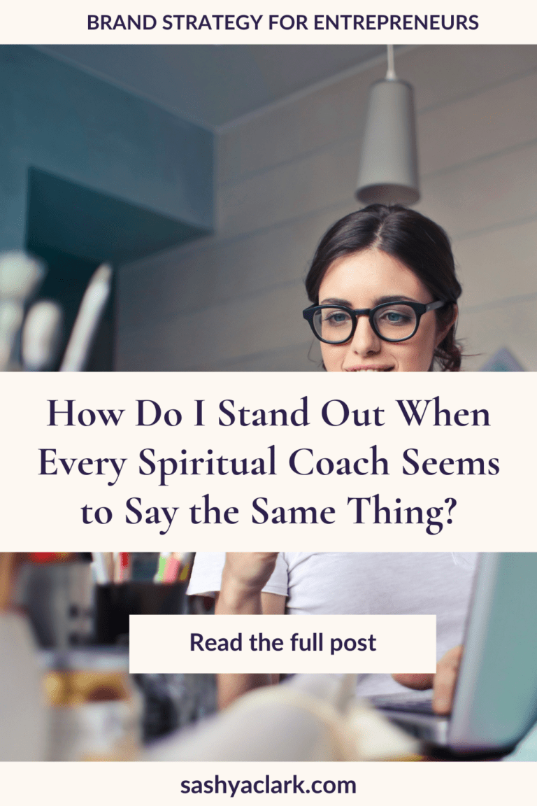 Woman in a white tshirt with a smart phone in her hand, the text overlay says, "How do I stand out when every spiritual coach seems to say the same thing? by Sashya Clark, Brand Strategist"