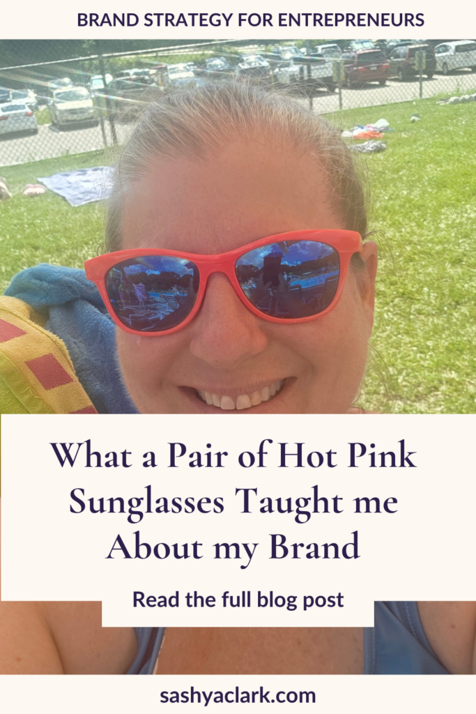 Woman in hot pink sunglasses at a crowded pool, brand strategist lesson on being findable